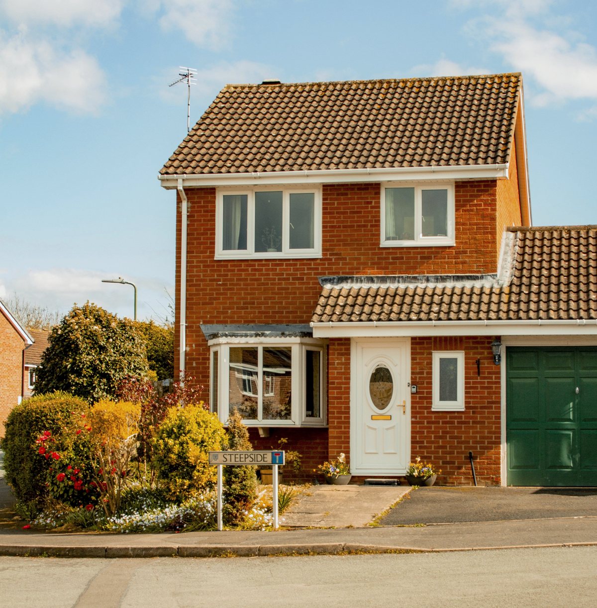 A red-brick detached rental home